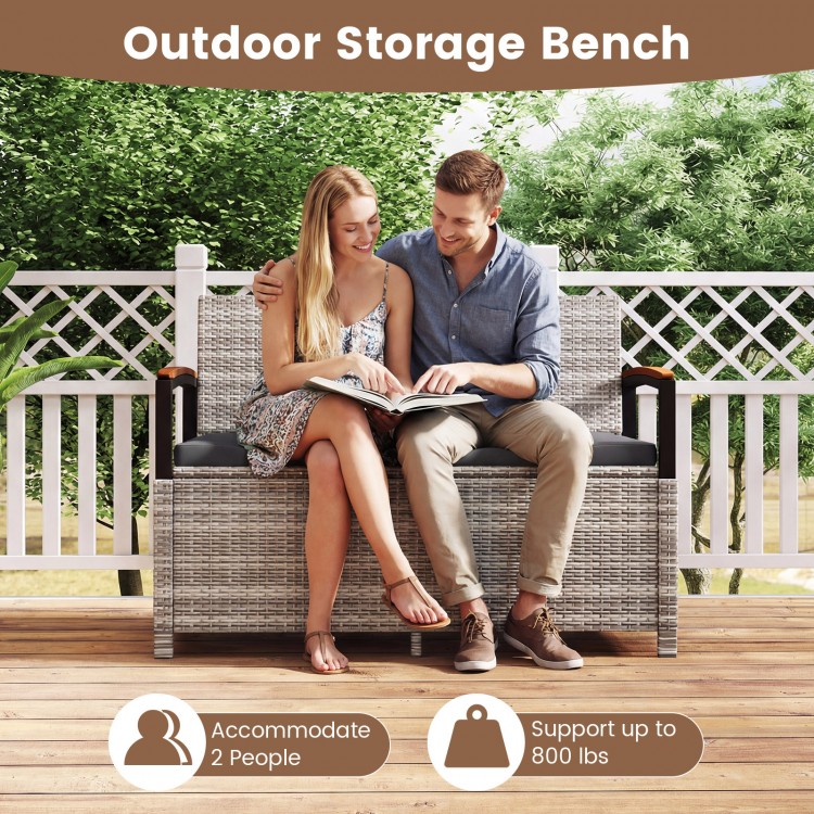 Gray outdoor storage bench with cushion, accommodates 2 people, supports 800 lbs, perfect for patio or garden use.
