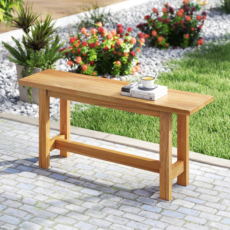 Teak wood bench with H-shaped legs, perfect for outdoor spaces like porches and patios, seating two comfortably.