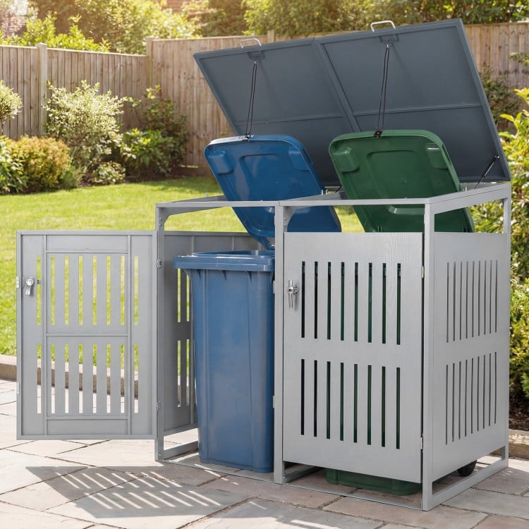 Outdoor trash can storage shed for 2 bins with gas struts, silver finish, ideal for garden or patio organization.