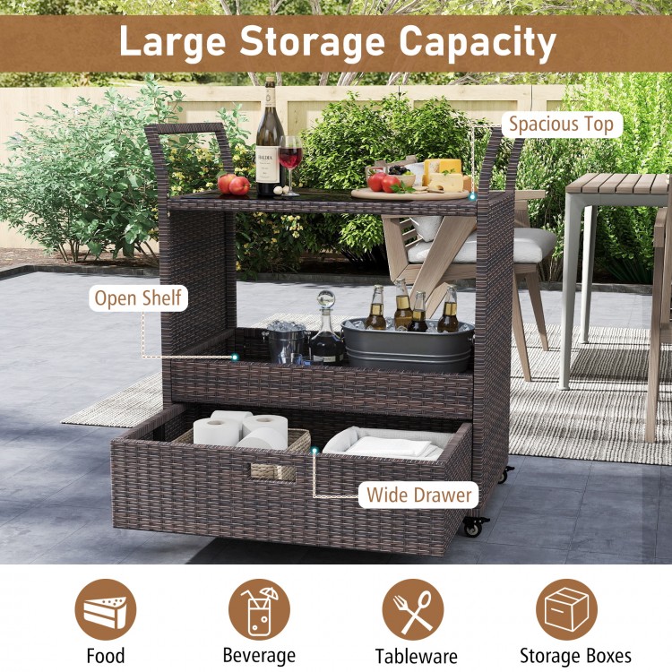 Outdoor wicker bar cart with tempered glass top, featuring ample storage, open shelf, and large drawer for patio use.