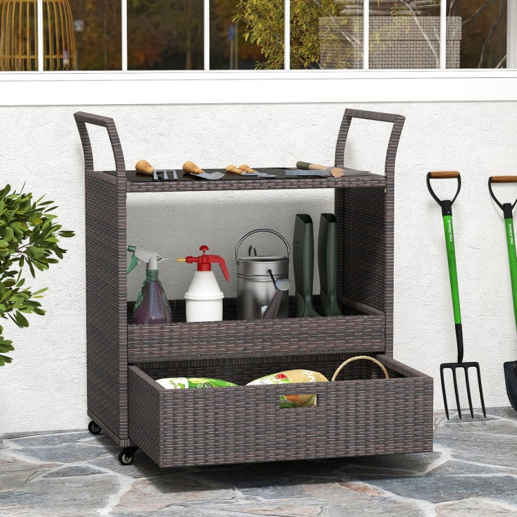 Outdoor wicker bar cart table with tempered glass top, featuring ample storage and mobility, ideal for patio or garden.