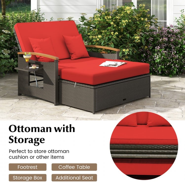 Red outdoor wicker daybed with storage ottoman, featuring adjustable backrest and comfortable cushions for patio.