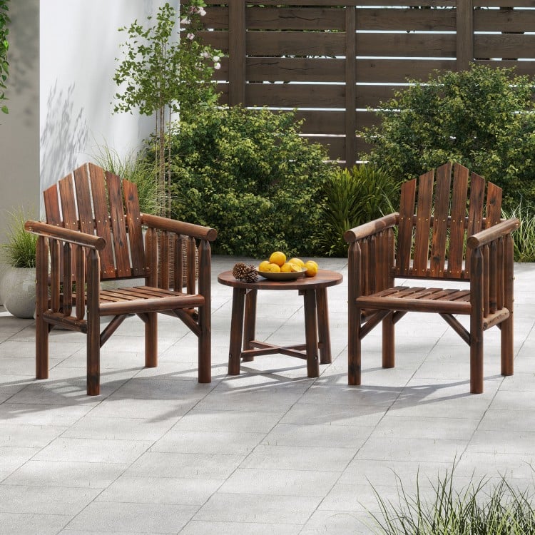 Two brown wooden patio armchairs with a small round table, perfect for outdoor relaxation and dining.