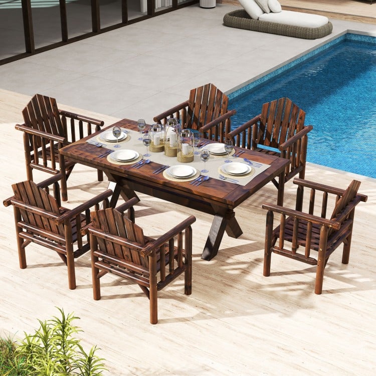 Outdoor wooden patio dining set featuring six brown armchairs and a large table, perfect for poolside dining.