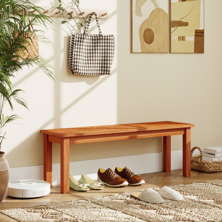 Backless outdoor wood bench with slatted seat, solid construction for 2-person seating, ideal for patio or garden use.