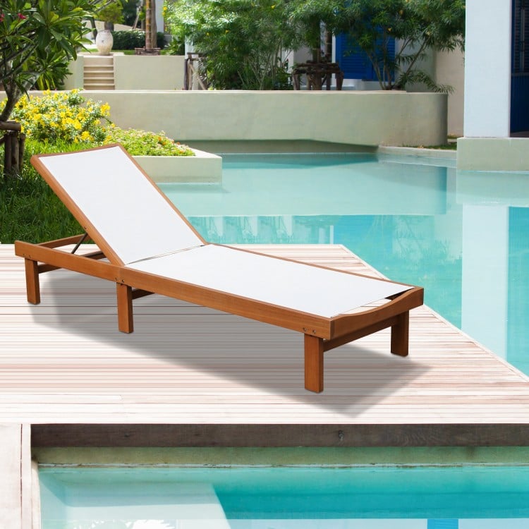Outdoor wood chaise lounge chair with 5-position adjustable back, perfect for sunbathing by the poolside.