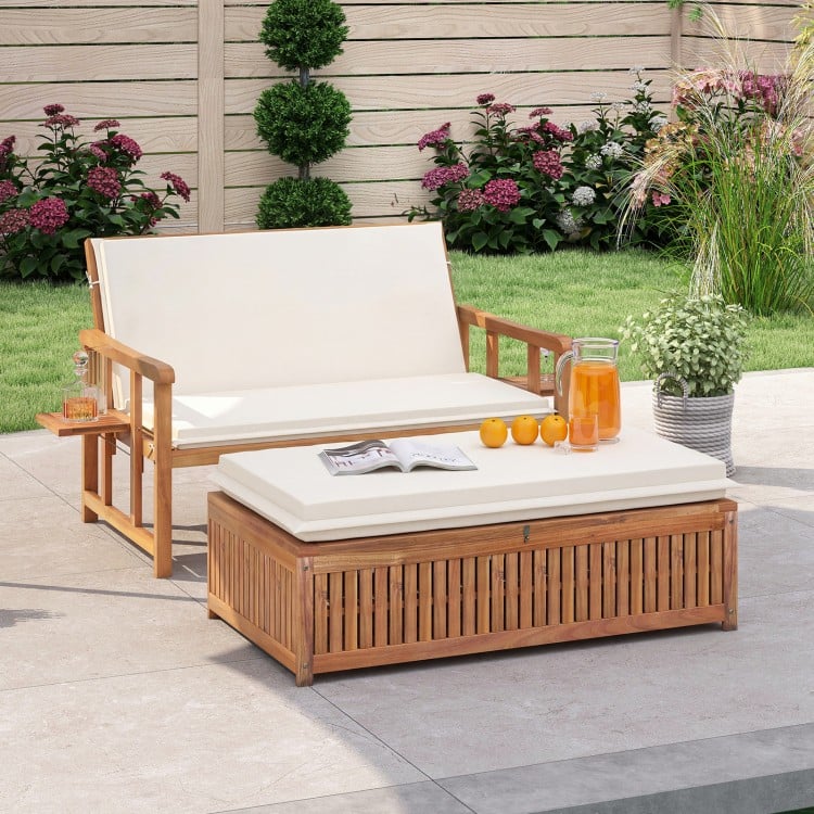 Outdoor wooden daybed with removable cushions, adjustable backrest, and acacia wood frame for backyard relaxation.