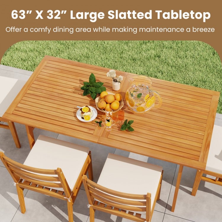 Outdoor wooden dining table with slatted 63” x 32” top, crafted from acacia wood, perfect for dining and socializing.