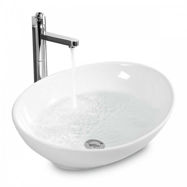 Oval ceramic vessel sink with popup drain design, perfect for contemporary bathroom upgrades and aesthetic appeal.