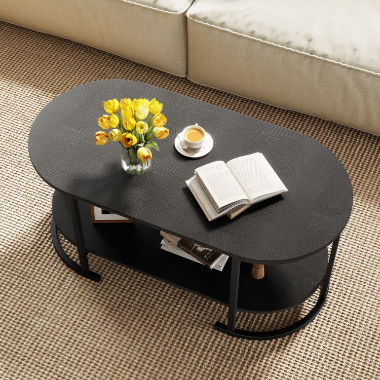 Oval coffee table with a black wooden finish, featuring a spacious 2-tier shelf for storage and a stylish design.