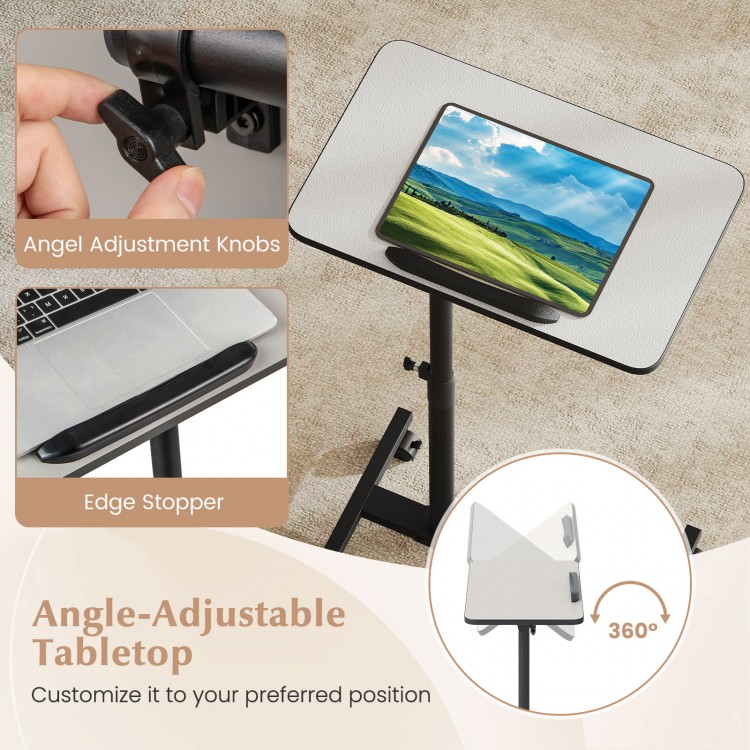 Gray overbed rolling table food tray featuring an angle-adjustable tabletop and edge stopper for secure use while.