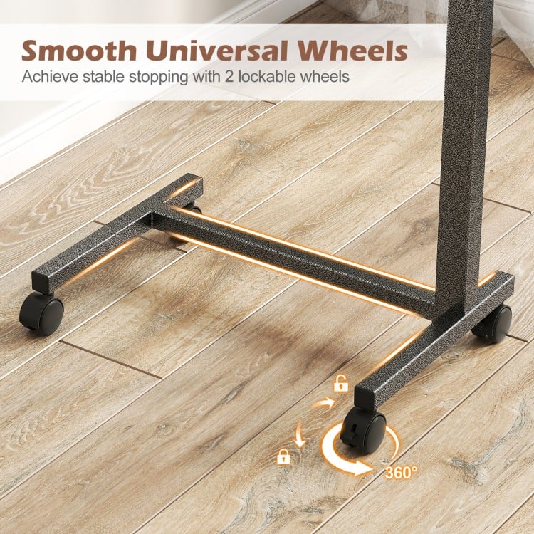 Lockable rolling wheels provide stability and mobility for the walnut overbed table with a sturdy H-shaped base.