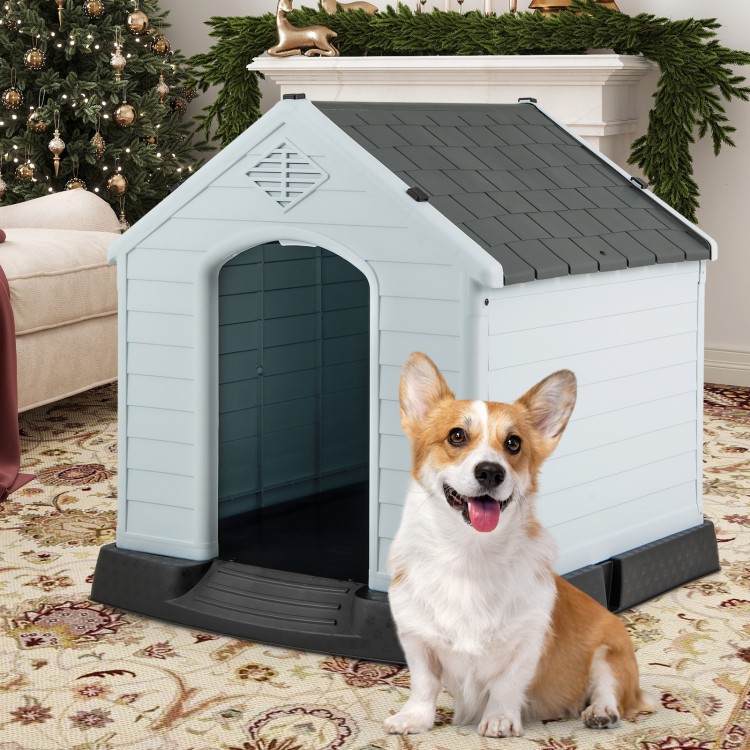 Small dog house made of waterproof plastic with elevated floor, providing comfort and protection from the elements.