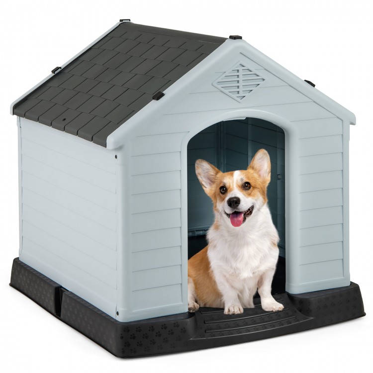 Small dog house made of waterproof plastic with elevated floor, providing protection from weather elements and comfort.