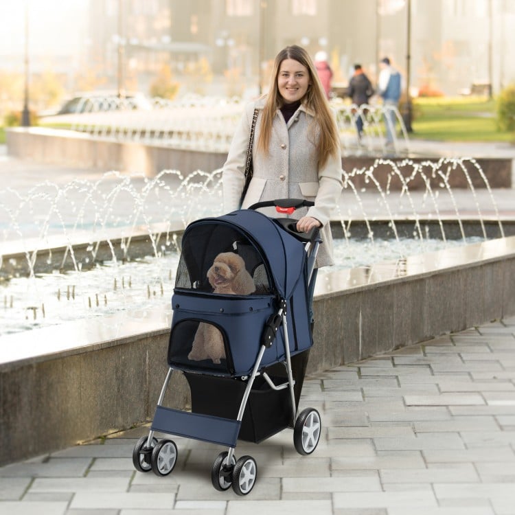 Foldable navy pet stroller with 4 wheels, mesh windows, and storage basket, perfect for outdoor adventures with pets.