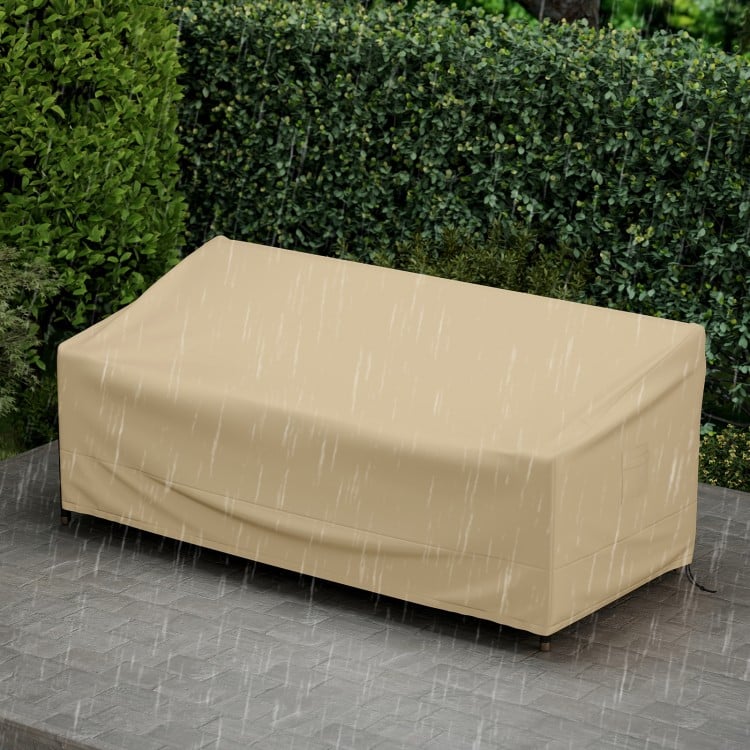 Patio furniture cover in beige, 77 x 43 x 30 inches, featuring padded handles and click-close straps for secure.