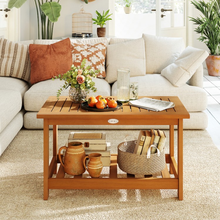 Rectangular 2-tier acacia wood coffee table with natural finish, perfect for indoor or outdoor use in living spaces.