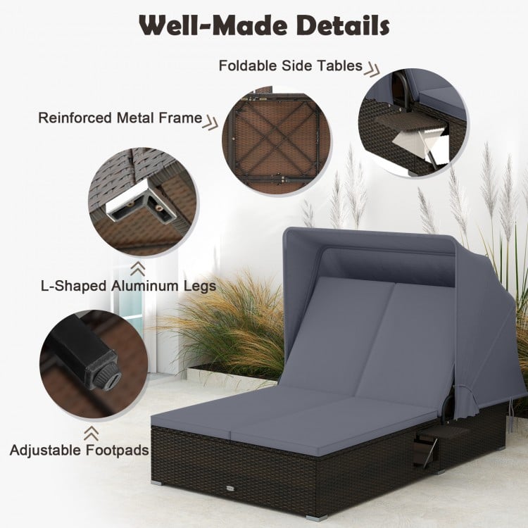 Patio double chaise lounge with gray cushions, adjustable backrests, and folding side tables for outdoor relaxation.