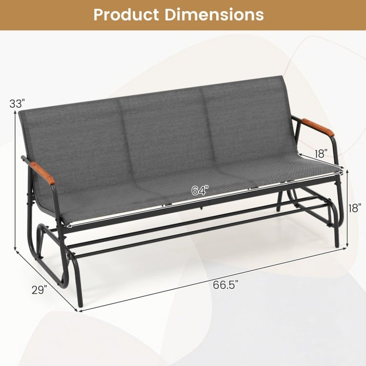 Patio glider bench dimensions showing a grey breathable fabric seat and curved teak armrests for outdoor comfort.