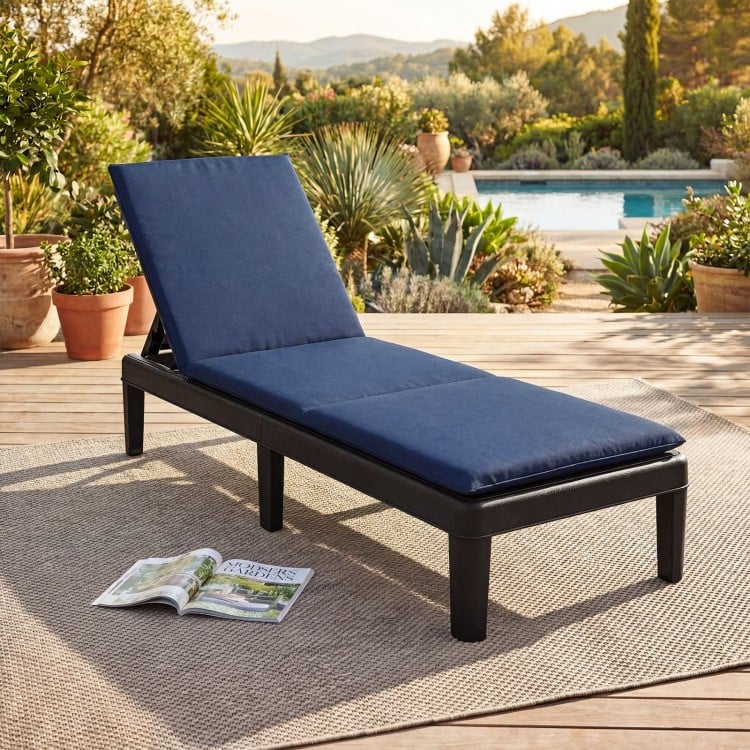 Patio lounge chair with blue cushion and adjustable backrest, made of durable all-weather PP material for outdoor use.