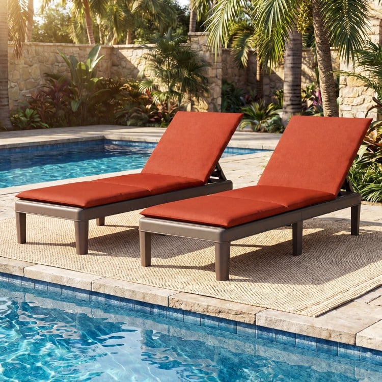 Patio lounge outdoor recliner chairs with orange cushions, featuring a 3-position adjustable backrest by the poolside.