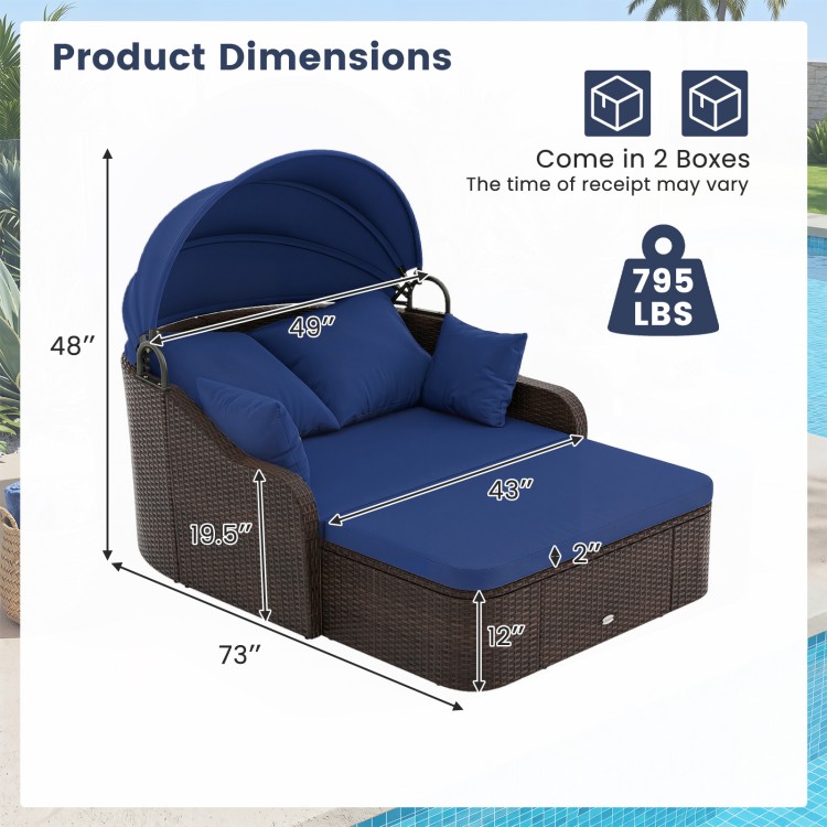 Patio PE rattan daybed with retractable canopy, navy cushions, and dimensions of 73" x 48" x 12" for outdoor relaxation.