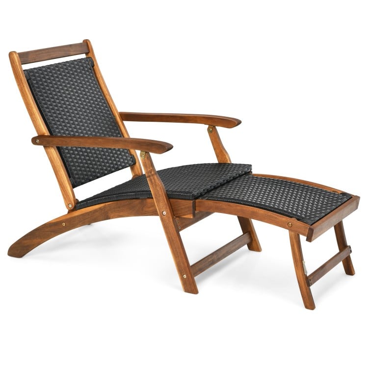 Patio rattan folding lounge chair with acacia wood frame and retractable footrest, perfect for garden or poolside.