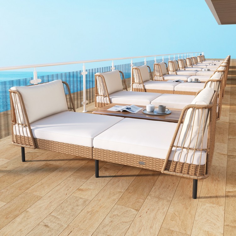 Patio wicker daybed in boho style with white cushions, perfect for outdoor relaxation and seating for two.