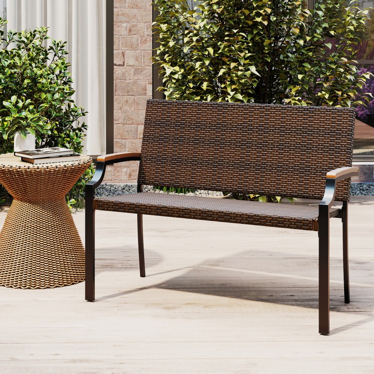 Patio wicker loveseat chair with acacia wood armrests and metal frame, perfect for outdoor porch or garden seating.