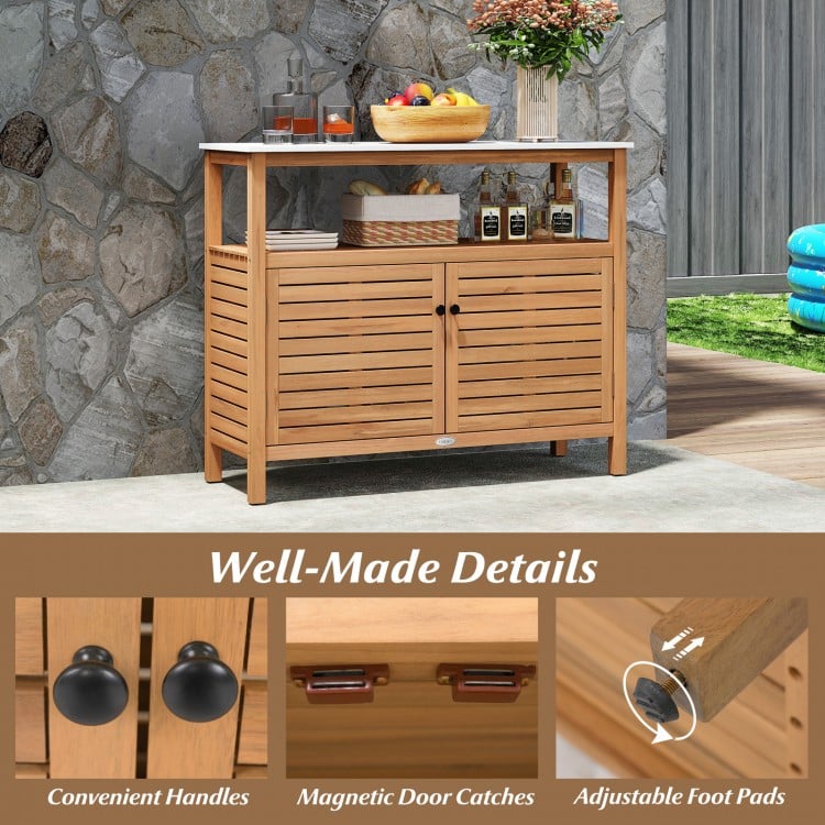 Patio wood storage cabinet made of acacia wood with a marble-like countertop, ideal for outdoor kitchens and gardens.