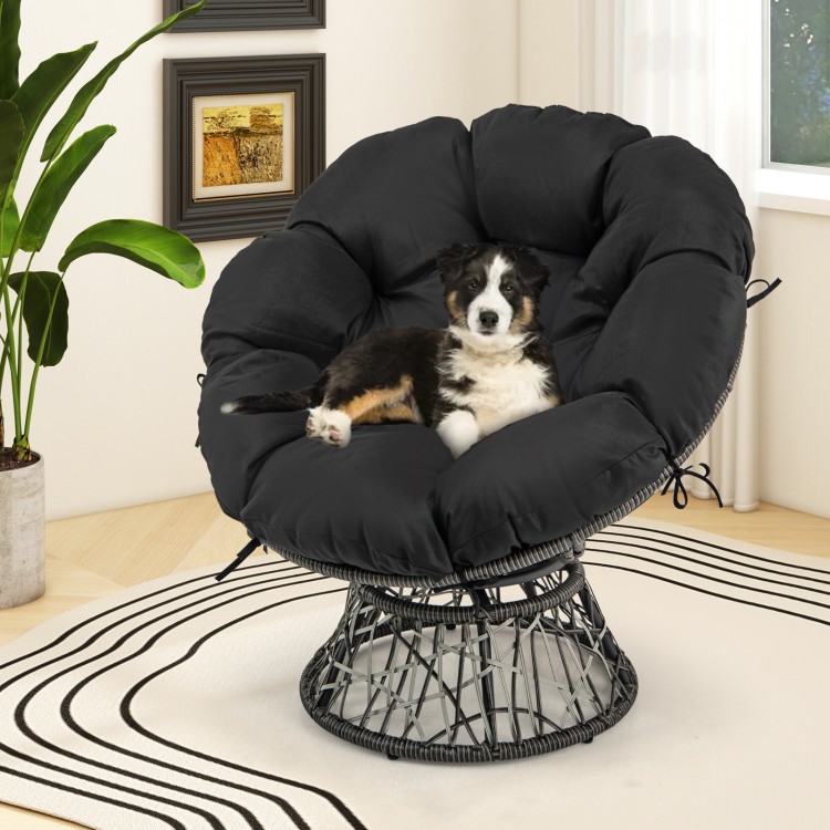 Overstuffed black PE wicker papasan chair with thick cushion, perfect for indoor or outdoor relaxation.