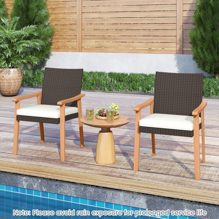 Outdoor patio dining chair set featuring PE rattan, acacia wood armrests, and removable cushions for comfort.
