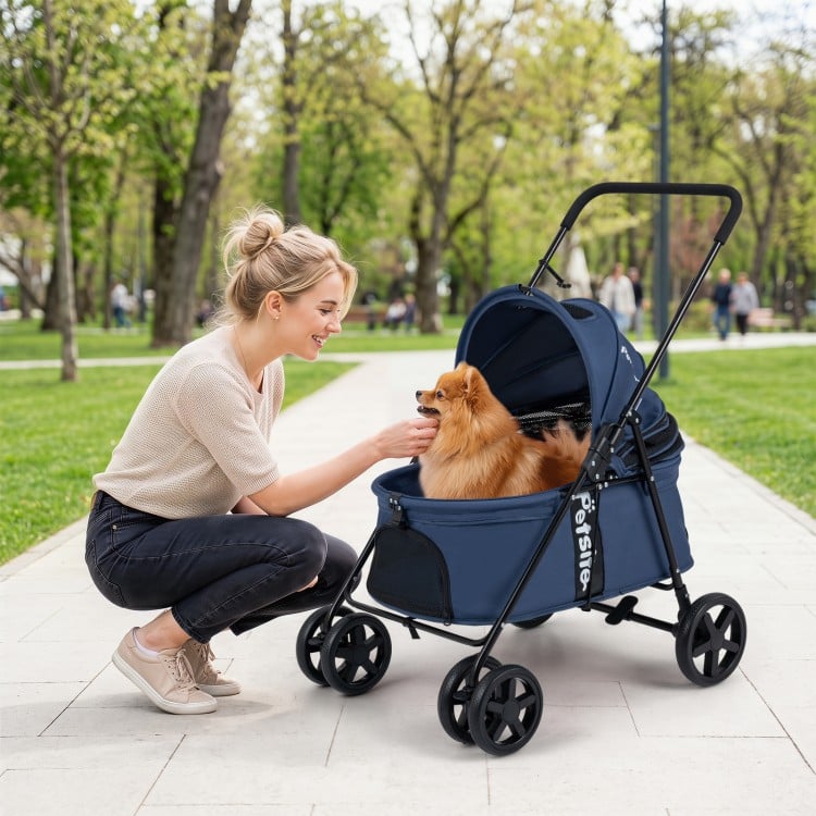 Pet stroller for small to medium dogs in navy, featuring a foldable design, breathable mesh, and 360° swivel wheels.