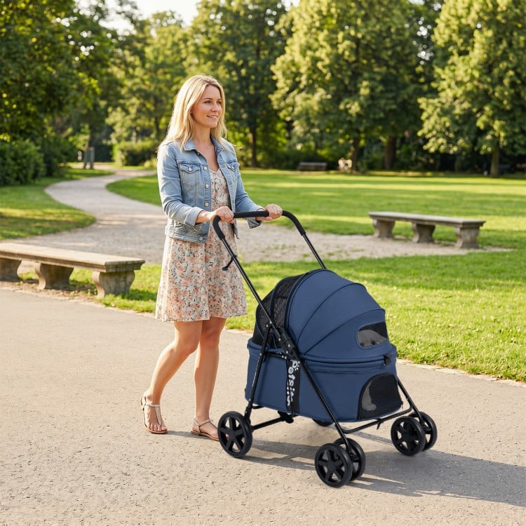 Navy pet stroller for small to medium dogs, featuring a foldable design, breathable mesh, and one-step rear brake.