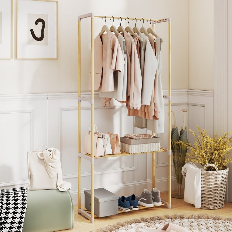 Pine wood clothes rack with hanging rod and 2-tier open storage shelf, perfect for organized bedroom or hallway use.