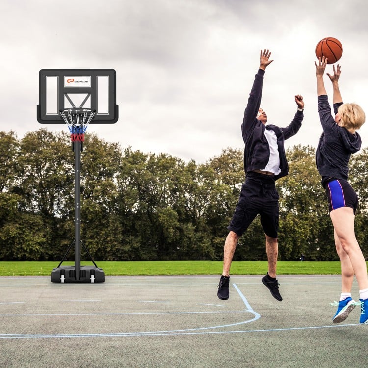 Portable basketball hoop with adjustable height, shatterproof backboard, and stability features for outdoor play.
