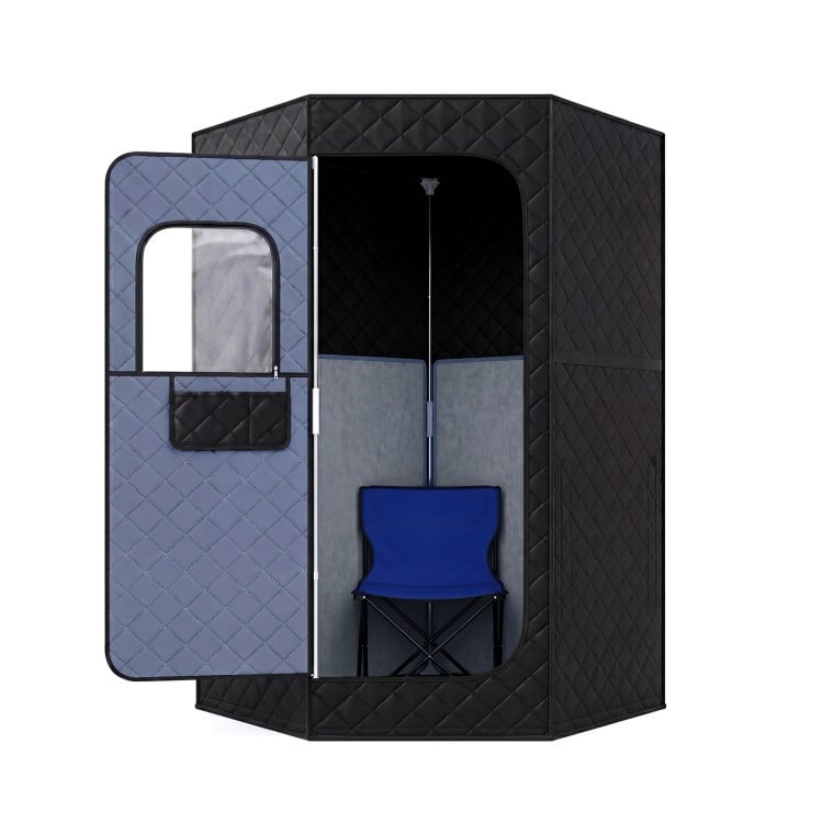 Portable black far infrared sauna box with a chair inside, featuring windows and pockets for convenience and comfort.