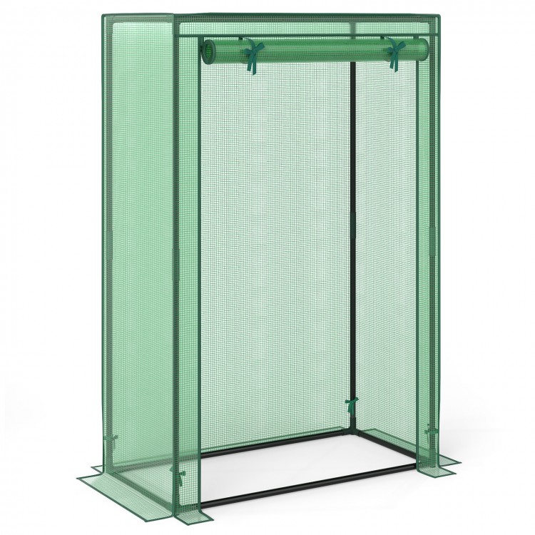 Portable mini greenhouse in green with roll-up zippered door, ideal for small spaces and promoting healthy plant growth.