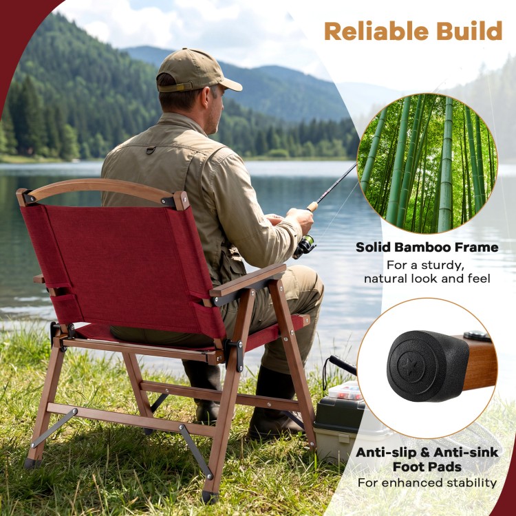 Portable folding camping chair in red with a solid bamboo frame, ideal for fishing and outdoor leisure activities.