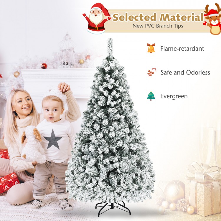 Snow-flocked 6 ft artificial Christmas tree with LED lights, ideal for festive home or office decoration.
