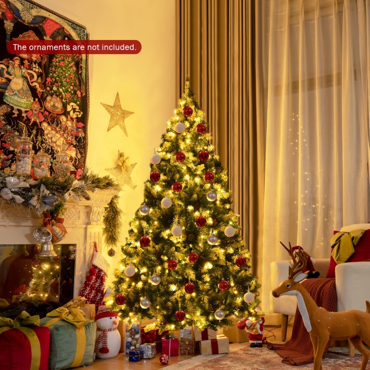 Snow flocked 6-foot Christmas tree with red berries and 250 warm white LED lights, perfect for festive home decoration.