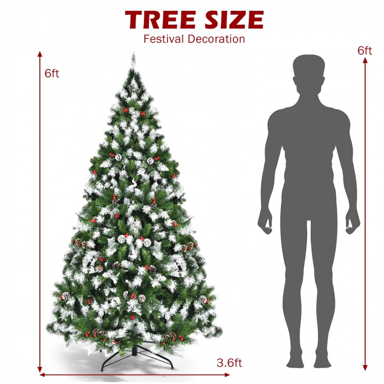 6ft pre-lit snow flocked Christmas tree with red berries and 250 LED lights, perfect for festive home decoration.