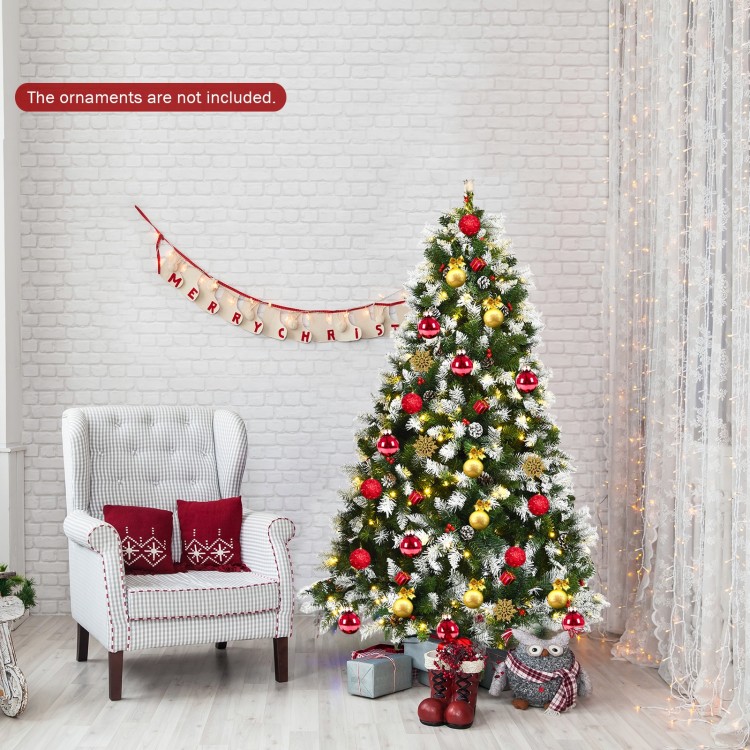 Snow flocked 6ft Christmas tree with red berries and 250 warm white LED lights, perfect for festive home decoration.