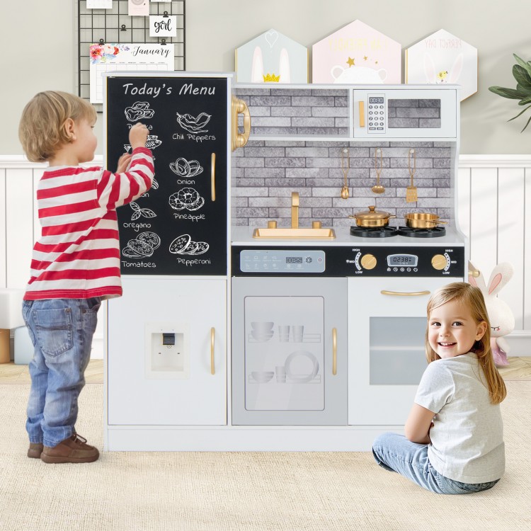 Children playing with a white pretend play kitchen featuring a sink, oven, and utensils for imaginative cooking fun.