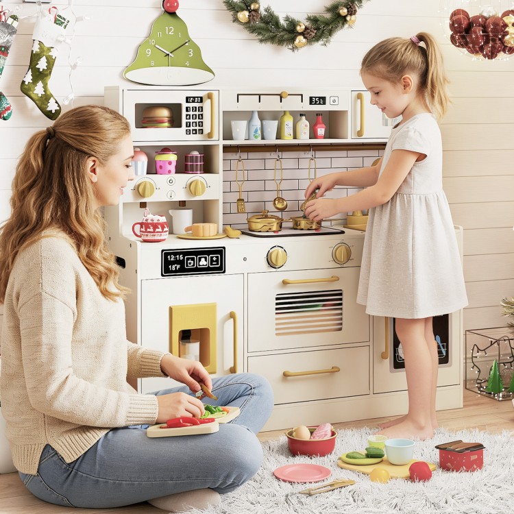 Beige pretend toy kitchen set showcasing a child cooking with stoves, featuring realistic sounds and colorful.