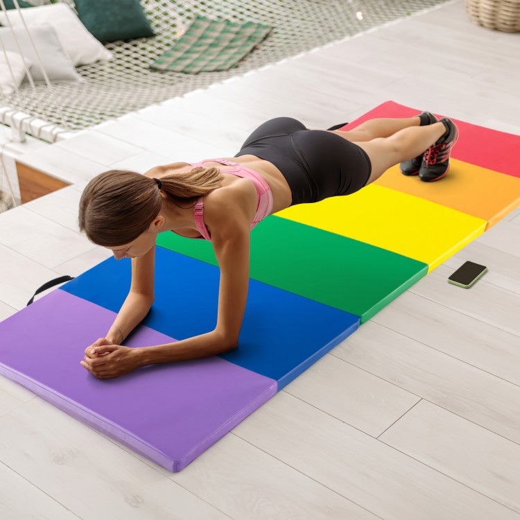 Colorful PU leather tri-folding gymnastics mat with EPE foam, ideal for yoga and stretching, shown in use during a.