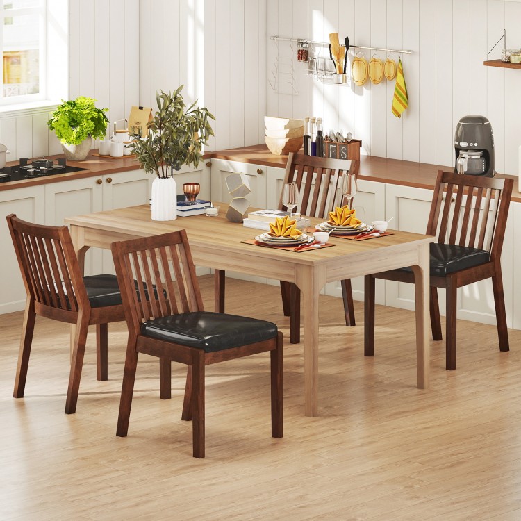 Espresso PU leather upholstered dining chairs with padded seats, set of 4, in a kitchen setting for versatile use.