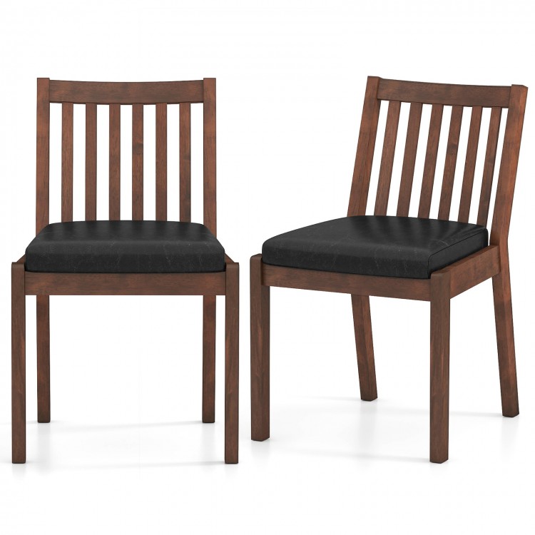 Set of 2 PU leather upholstered dining chairs in espresso with padded seats and ergonomic slanted backrests for comfort.