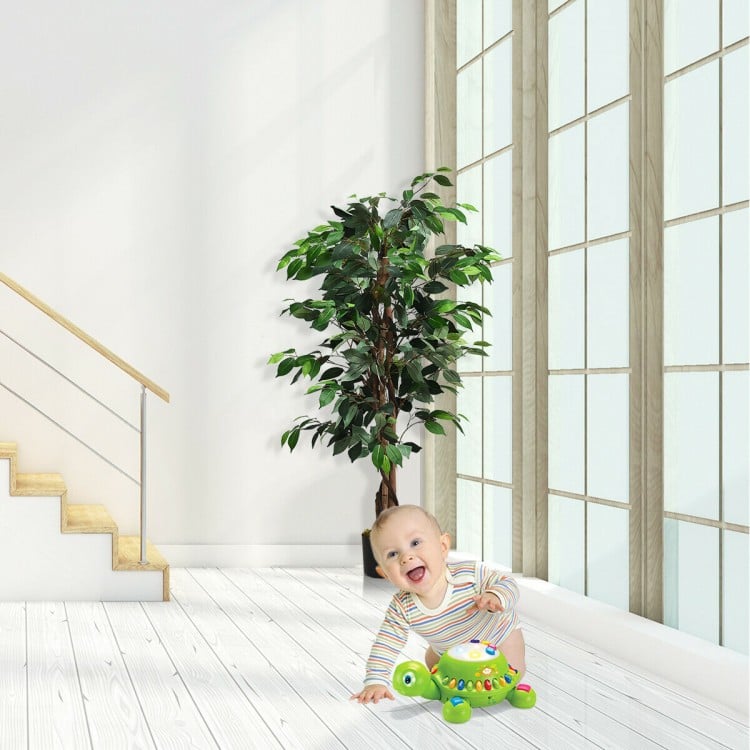 Artificial ficus tree with 504 leaves and realistic texture, perfect for home or office decor near windows.