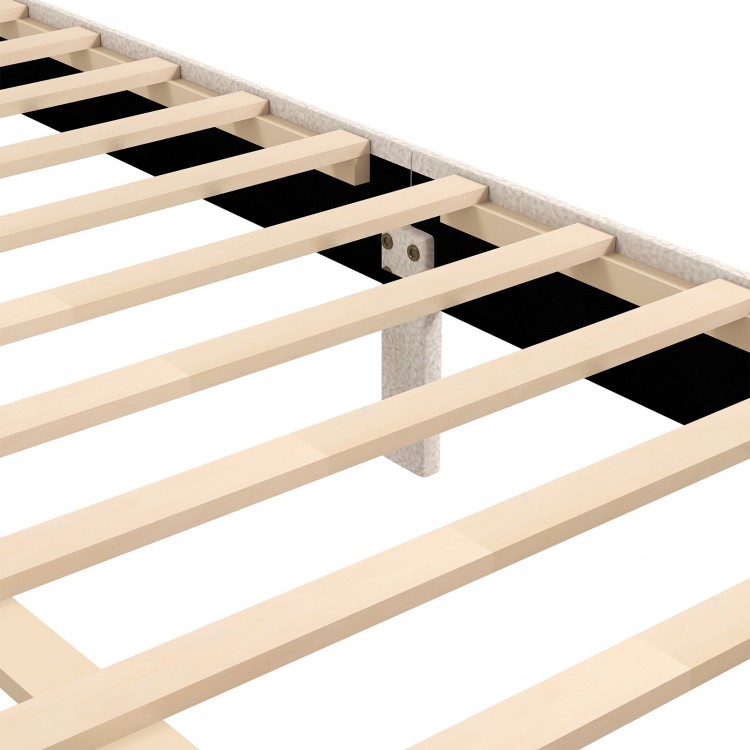 Close-up of the wooden slats of a queen size bed frame with storage drawer, featuring beige upholstery and support legs.